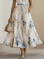 Chloe | Abito midi plissettato in chiffon floreale bianco con scollatura a V