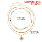 Set di Collane a Strati Parel & Occhio Maligno – Ciondolo Sole Boho