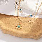 Set di Collane a Strati Parel & Occhio Maligno – Ciondolo Sole Boho