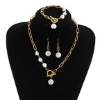 Set di Collana, Bracciale e Orecchini in Perle Paperclip Eleganti