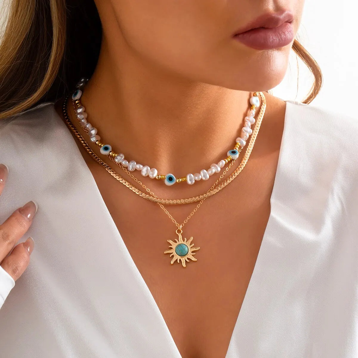 Set di Collane a Strati Parel & Occhio Maligno – Ciondolo Sole Boho